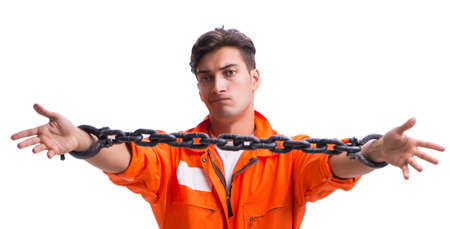 Prisoner with his hands chained isolated on white backgroundの写真素材