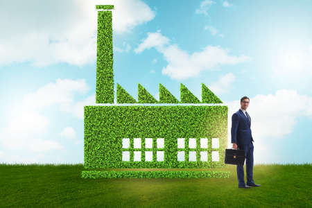 Businessman in green housing conceptの写真素材
