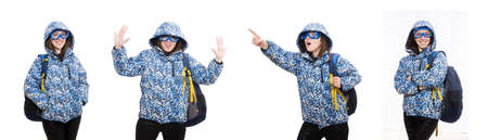 Young optimistic girl with rucksack isolated on whiteの写真素材