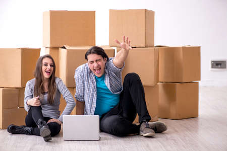Young pair moving to new flat