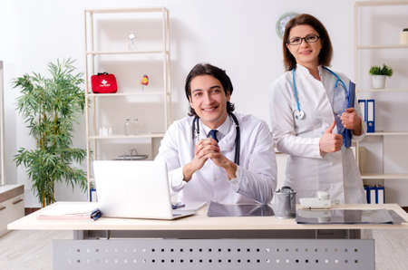 Two doctors working in the clinicの写真素材