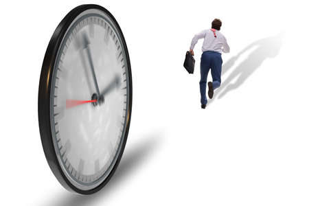 Businessman employee in time management conceptの写真素材