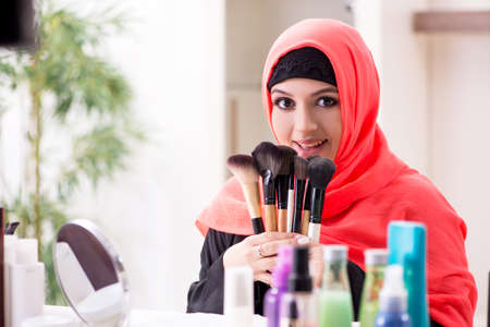 Beauty blogger in hijab recording video for her blog