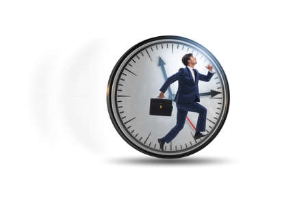 Businessman employee in time management conceptの写真素材