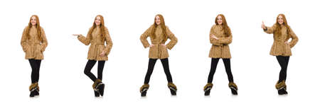 Redhead girl in fur coat isolated on whiteの写真素材