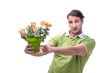 Young man suffering from allergy isolated on a white backgroundの写真素材