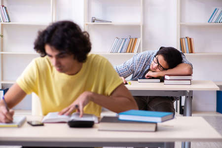 Two male students in the classroomの写真素材