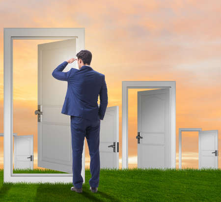 Businessman facing many business opportunitiesの写真素材