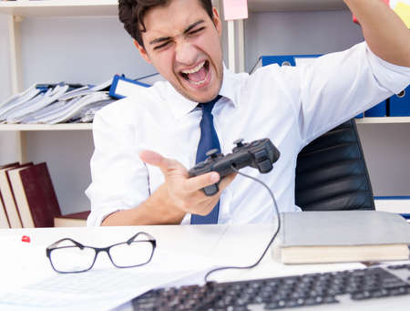 Employee playing computer games in the office
