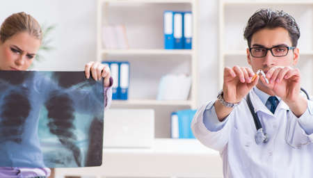 Doctor examining x-ray images of patient