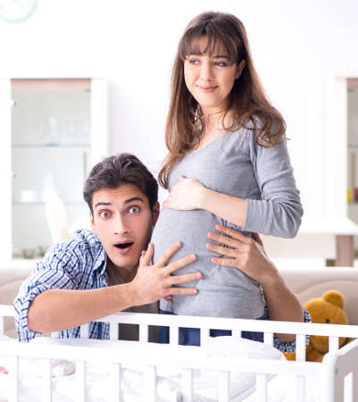Young parents expecting their first babyの写真素材