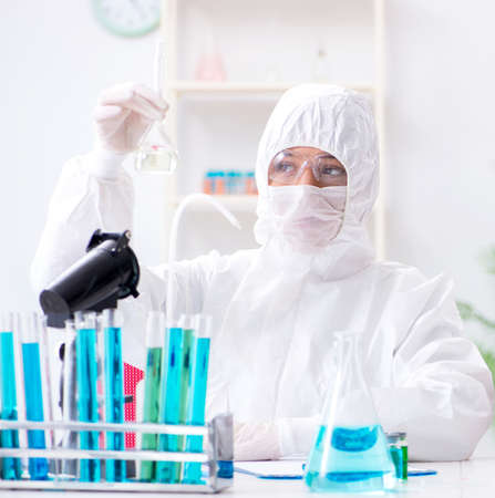 Two chemists working in the lab