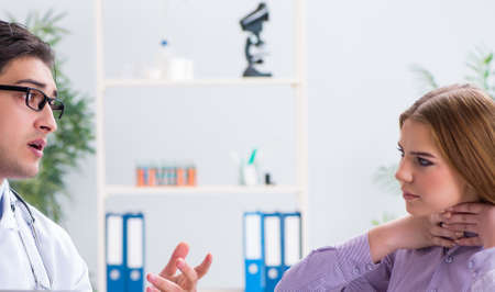 Patient visiting doctor for medical check-up in hospitalの写真素材