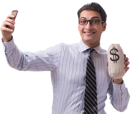 Young businessman with money sack isolated on white backgroundの写真素材