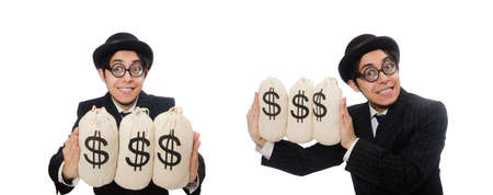 Young employee holding money bags isolated on whiteの写真素材