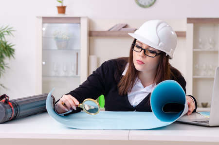 Female designer working in the officeの写真素材