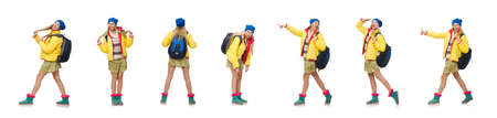 A girl in bright winter clothes isolated on whiteの写真素材
