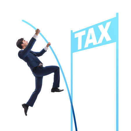 Businessman jumping over tax in tax evasion avoidance conceptの写真素材