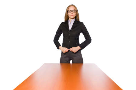 Female employee sitting at long table isolated on whiteの写真素材