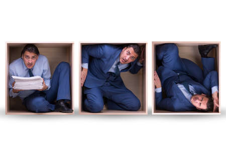 Employee working in tight spaceの写真素材