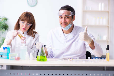 Two chemists working in the labの写真素材