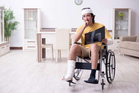 Young man after accident recovering at home