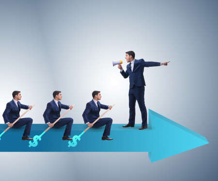 Team of businessmen in teamwork concept with boat