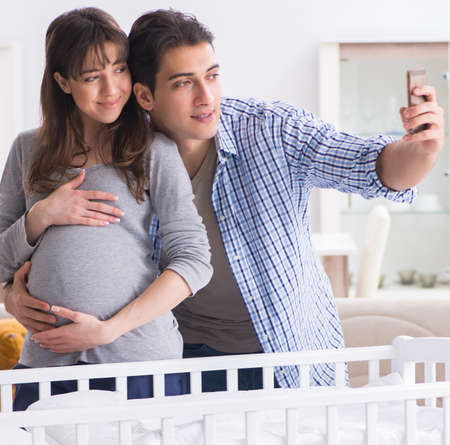 Young parents expecting their first babyの写真素材