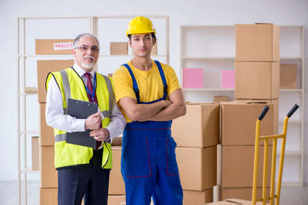 Professional movers doing home relocationの写真素材