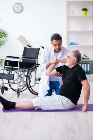 Aged patient recovering from injury in hospitalの写真素材