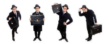 Young man holding suitcase isolated on whiteの写真素材