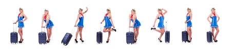 Woman travel attendant with suitcase on whiteの写真素材