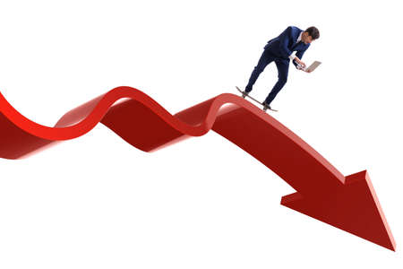 Businessman riding skateboard on financial graphの写真素材