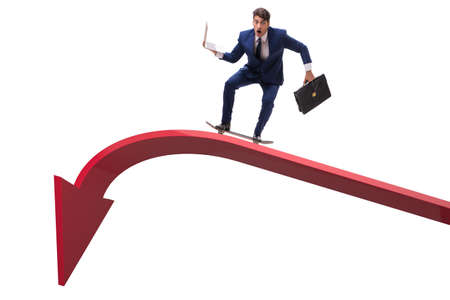 Businessman riding skateboard on financial graphの写真素材