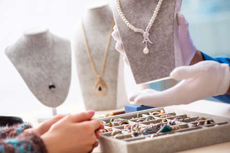 The young jeweler working in his workshopの写真素材