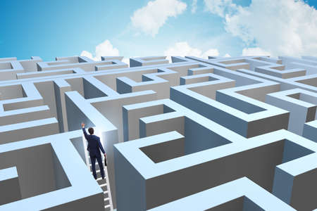 Businessman trying to escape from maze