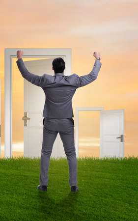 Businessman facing many business opportunitiesの写真素材