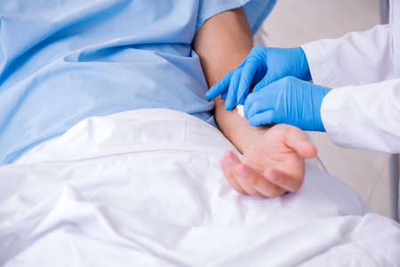 Male patient in blood transfusion concept
