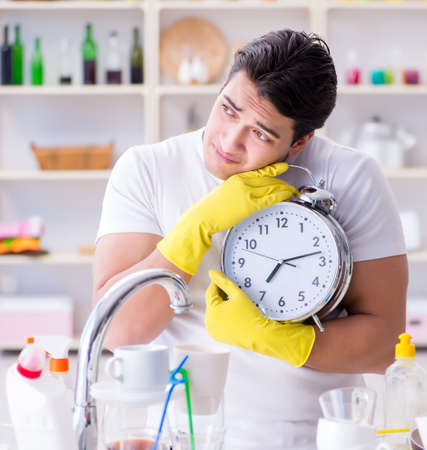 Man failing to meet the deadlines of housekeeping jobの写真素材