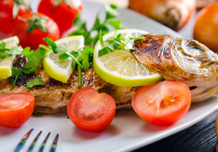 Fried fish served on the plate