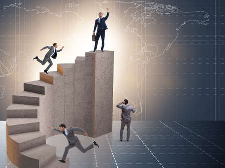 Business concept with business people on staircaseの写真素材