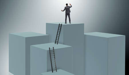 Businessman climbing blocks in challenge business conceptの写真素材