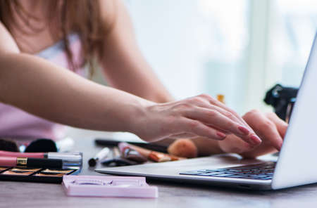 Fashion blogger with make-up accessoriesの写真素材