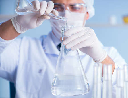 Female scientist researcher conducting an experiment in a labの写真素材