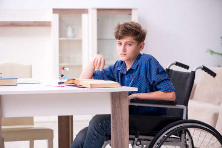 Disabled kid preparing for school at homeの写真素材