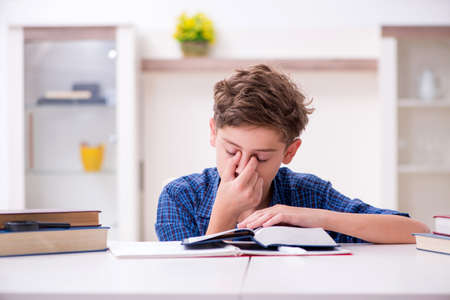 Kid preparing for school at homeの写真素材