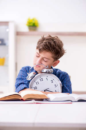 Kid preparing for school at homeの写真素材