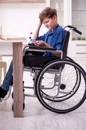 Disabled kid preparing for school at homeの写真素材
