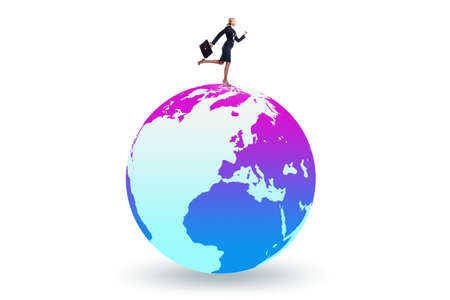 Businesswoman on top of the worldの写真素材