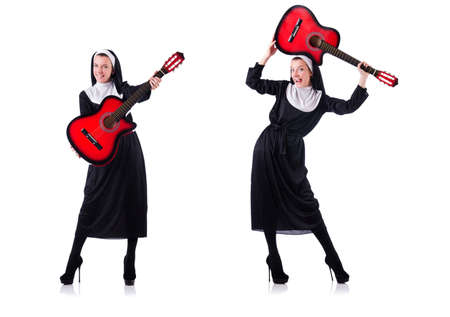 Nun playing guitar isolated on whiteの写真素材
